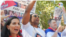 La dirigente española de origen cubano del partido VOX, Rosario Monasterio, y el artista y activista Yotuel Romero, encabezaron la protesta, que empezó en Cuesta de Moyano y terminó en la céntrica Plaza de Cibeles, en Madrid, España. Foto: VOA/Júlia Riera.