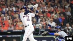 Houston Astros batter Yuli Gurriel hits a solo home run against the Los Angeles Dodgers