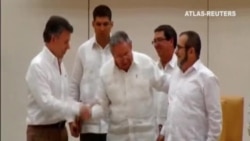 El gobierno colombiano y la guerrilla de las FARC se compromenten a firmar la paz el proximo año El gobierno colombiano y la guerrilla de las FARC se compromenten a firmar la paz el proximo año