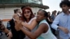 Agentes de civil reprimen a Ileana Hernández el 11 de mayo en 2019 en La Habana, durante una marcha LGTBI. Yamil Lage/AFP.
