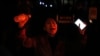 Una mujer grita durante una protesta en Beijing el domingo 27 de noviembre de 2022. (AP Foto/Ng Han Guan)